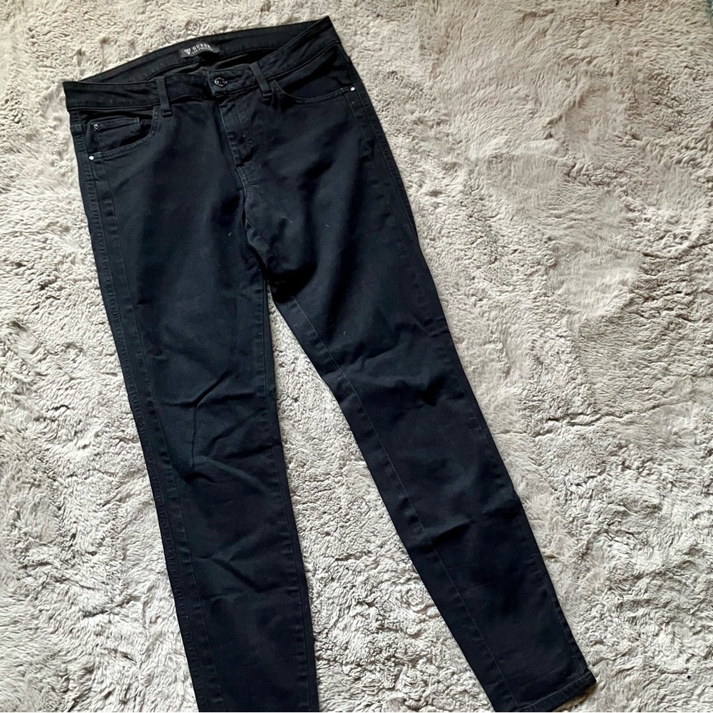 Black Guess stretch skinny jeans, worn but barely any fade to the black.